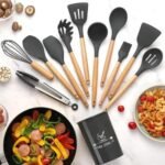 silicone kitchen utensil set with wooden handles and a storage holder.