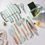 A set of Silicone kitchen utensils with wooden handles and a set of knives in a dual holder - Image 15
