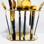 Gold-plated stainless steel cutlery set without a stand.