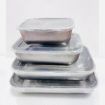 Stainless steel food storage containers with lids.