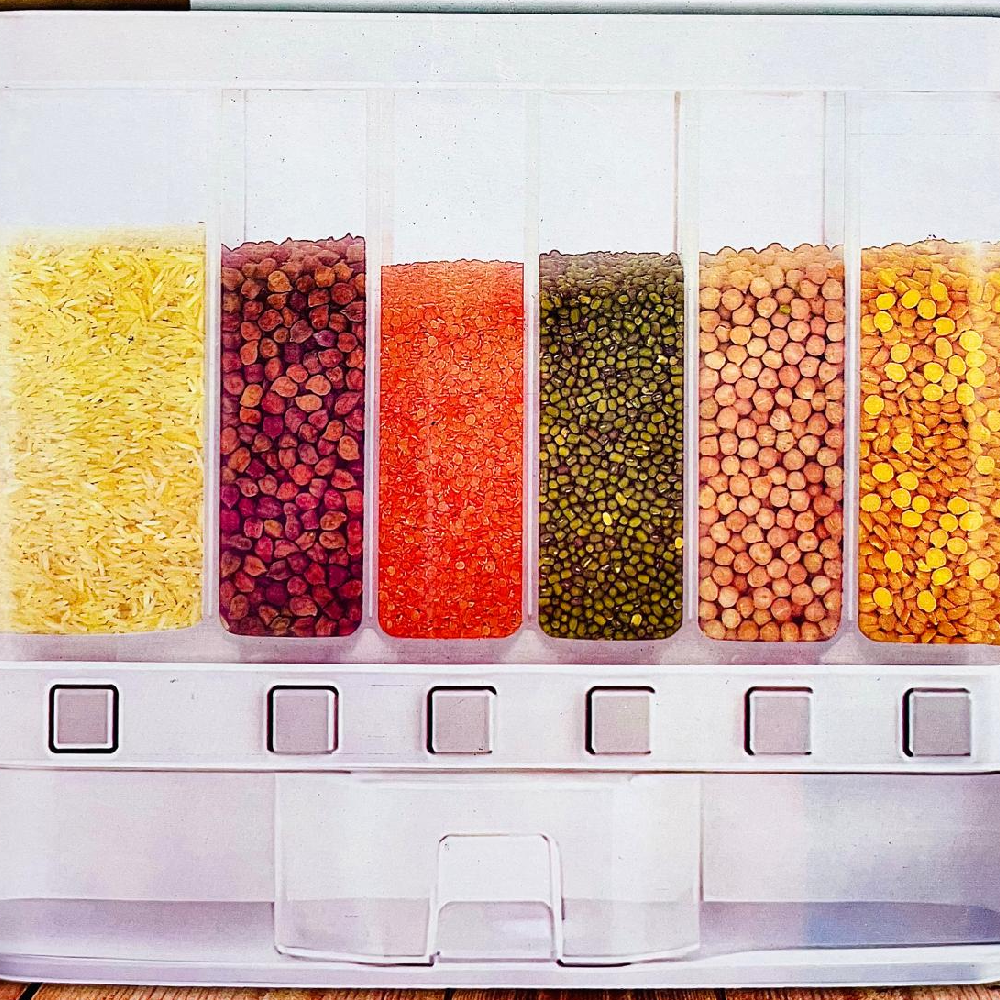 New Project (27) This is a wall-mounted dry food or cereal dispenser. - Image 1