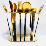 A set of gold-plated stainless steel cutlery without a stand.